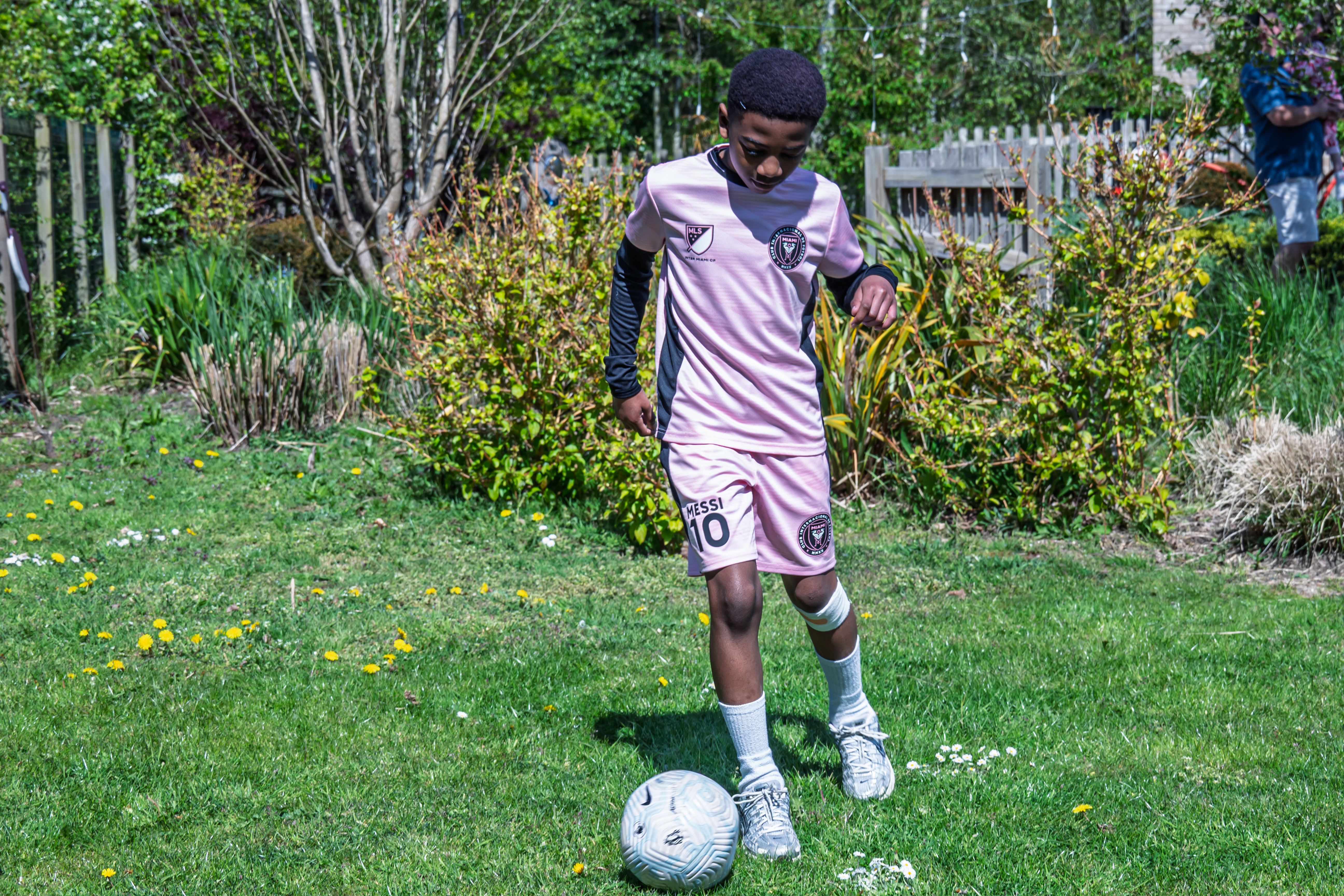 Ayden playing football at The Ark